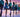Irish dancers from river dance show in a row dancing