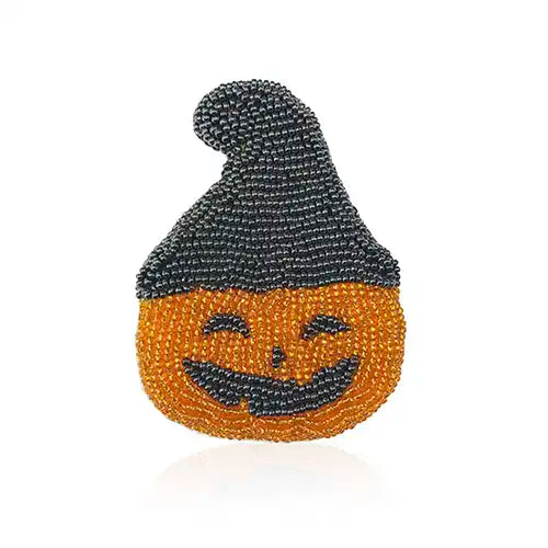 Halloween brooch of a pumpkin wearing a witch’s hat made of Preciosa Seed Beads