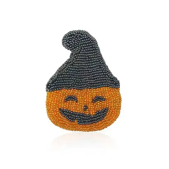 Halloween brooch of a pumpkin wearing a witch’s hat made of Preciosa Seed Beads