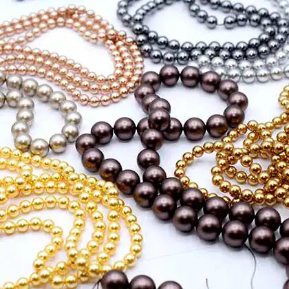 Half-Drilled, No Hole or Large Hole – Which Swarovski Pearls Are Right for You?