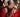 pretty lady wearing a red Burlesque Costume with rhinestones