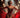 pretty lady wearing a red Burlesque Costume with rhinestones