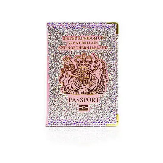 Pink faux leather passport protector covered in Crystal AB Serinity Flatback Crystals glued on with resin glue.