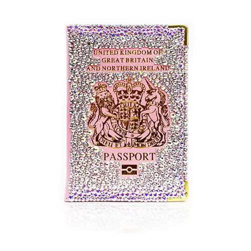 Pink faux leather passport protector covered in Crystal AB Serinity Flatback Crystals glued on with resin glue.