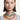 young lady wearing many layers of Swarovski millenia necklaces in different colours