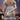 Lady from Bridgerton TV program in a posh dress